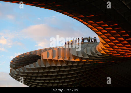 People taking the view from the platform of the Metropol Parasol in Seville, Spain Stock Photo