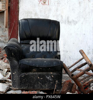 Ruined furniture left from demolished houses in Shanghai's Puxi district. Stock Photo