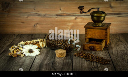 Still life with coffee, grinder and tulips. Vintage and rustic style Stock Photo