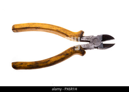 old pliers very used already and stained with grease and other things, on white background Stock Photo