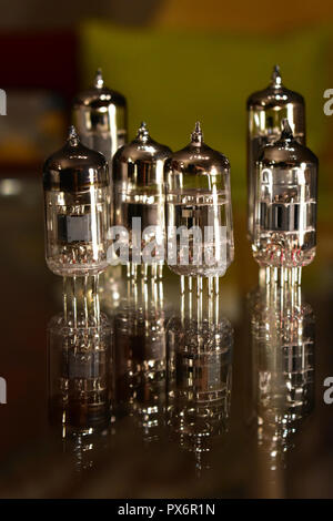 Tubes for guitar amplifier ECC83 - 12AX7 and EL84 type. Vacuum electron tubes close-up. Stock Photo