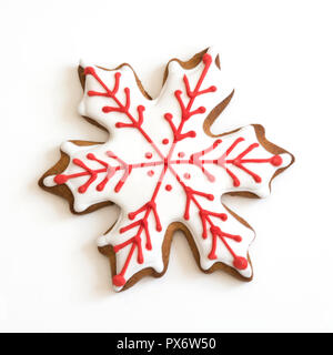 Snowflake shape christmas gingerbread isolated on white background. Stock Photo