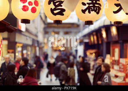 Blurred shoppers in Teramachi shopping arcade, Shinkyogoku popular historical shopping district in Kyoto, Japan 2017 Stock Photo