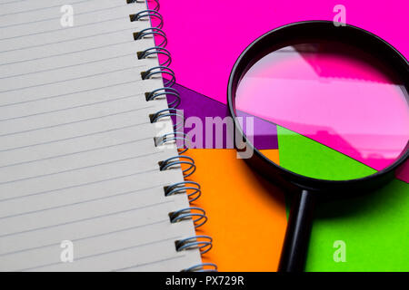 Opened book on colorful background Stock Photo