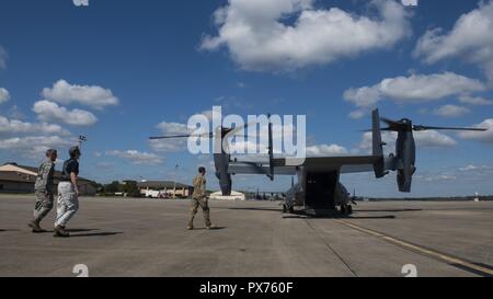 Secretary of the Air Force Heather Wilson steps to a CV-22 Osprey tiltrotor aircraft assigned to the 8th Special Operations Squadron at Hurlburt Field, Florida, Oct. 14, 2018, October 14, 2018. Aircrew members with the 8th SOS transported Air Force senior leaders from Hurlburt Field to Tyndall Air Force Base to assess the damage from Hurricane Michael, one of the most intense tropical cyclones to ever hit the U.S. (U.S. Air Force photo by Senior Airman Joseph Pick). () Stock Photo