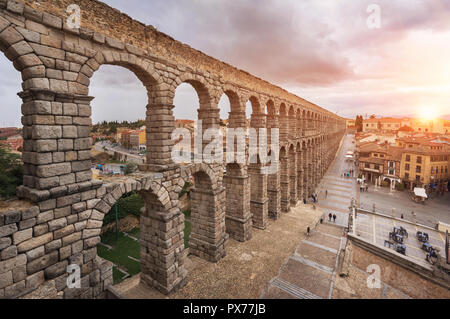 Dramatic sunset in famous Segovia aqueduct, Castilla y leon, Spain. Stock Photo