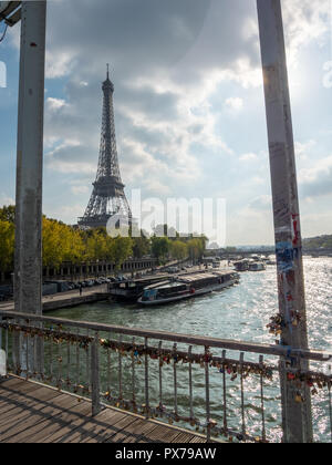 Picture of Couple's Locks on Bridge with the Eiffel Tower in the Background Stock Photo