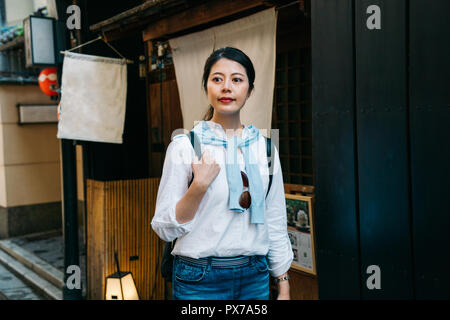 hungry traveler walking in the food street and finding lunch to eat. asian travel for Japanese local Food Journey.Translation of the flag text " ice c Stock Photo