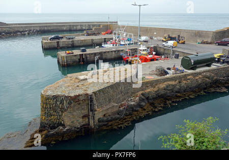 Fishing Boats in the Old Harbour at the Village of Amlwch Port on the Isle of Anglesey Coastal Path, Wales, UK. Stock Photo