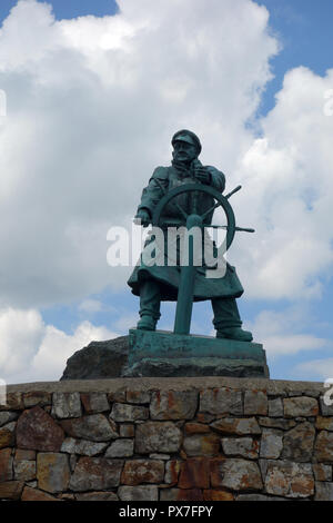 The Memorial the Coxwain Richard Evans near the Lifeboat Station and Shop at Moelfre on the Isle of Anglesey Coastal Path, Wales, UK. Stock Photo