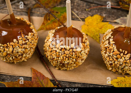 Caramel Apples on Wooden Background Stock Photo