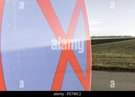 Road sign with stopping restriction Stock Photo