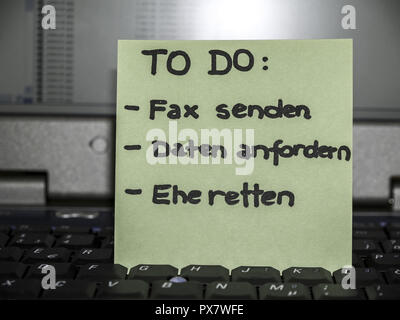 Memo note on notebook, to do send fax, get data, save marriage Stock Photo