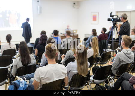 Professor lecturing in lecture hall at university. Stock Photo