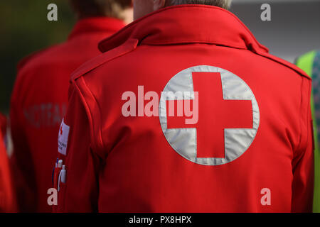 Details with the Austrian Red Cross symbol on a uniform Stock Photo