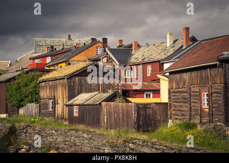 Mining town Røros in Norway, fantastic original old norwegian town, set as a UNESCO World Heritage Site. Traditional wooden architecture. Stock Photo