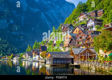 Traditional old wooden houses in famous Hallstatt mountain village at Hallstattersee lake in the Austrian Alps in summer, region of Salzkammergut, Aus Stock Photo