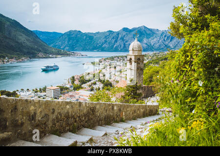 Classic panorama view of the historic Church of Our Lady of Remedy overlooking the old town of Kotor and world-famous Bay of Kotor, Montenegro, southe Stock Photo
