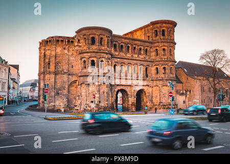 Classic view of famous Porta Nigra, the largest Roman city gate monument north of the Alps, in beautiful golden morning light at sunrise in summer, Rh Stock Photo