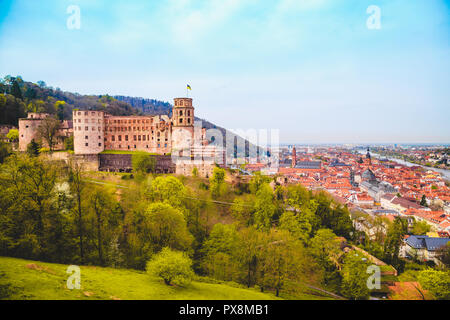 Panoramic view of the old town of Heidelberg with famous Heidelberg Castle on a beautiful sunny day with blue sky and clouds in springtime, Baden-Wuer Stock Photo