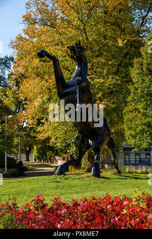 The metal black horse sculpture called Bucephalus and knew locally as Trigger. The sculpture was created by Simon Evans and is on Greyfriars Green in  Stock Photo