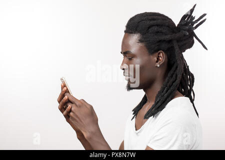 Afro American Man With Dreadlocks Viewing Photos In Social