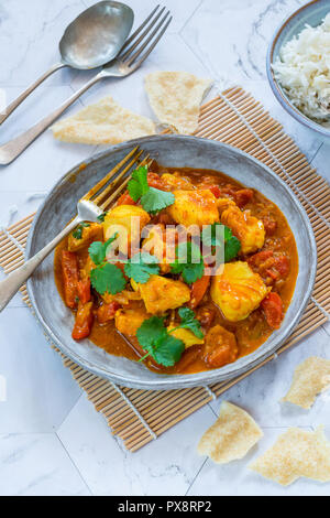 Fish Mappas - Keralan style coconut fish curry with rice. It's a popular dish in southern Indian state of Kerala. High angle view