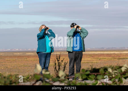 Southport, Merseyside. UK Weather 20/10/2018. Sunny day for birdwatchers, birders, bird watching on the RSPB Marshside Nature Reserve, in the Ribble Estuary. Credit: MediaWorldImages/AlamyLiveNews. Stock Photo