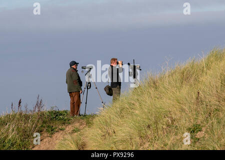 Southport, Merseyside. UK Weather 20/10/2018. Sunny day for birdwatchers, birders, bird watching on the RSPB Marshside Nature Reserve, in the Ribble Estuary. Credit: MediaWorldImages/AlamyLiveNews. Stock Photo