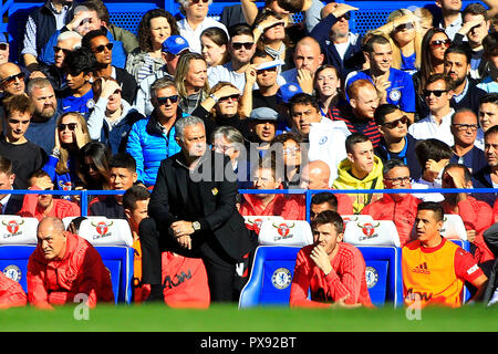 London, UK. 20th Oct, 2018. Manchester United Manager Jose Mourinho looks fed up as he watches his team play. Premier League match, Chelsea v Manchester United at Stamford Bridge in London on Saturday 20th October 2018. this image may only be used for Editorial purposes. Editorial use only, license required for commercial use. No use in betting, games or a single club/league/player publications. pic by Steffan Bowen/ Credit: Andrew Orchard sports photography/Alamy Live News Stock Photo