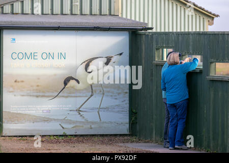 Southport, Merseyside. UK Weather 20/10/2018. Sunny day for birdwatchers, birders, bird watching on the RSPB Marshside Nature Reserve, in the Ribble Estuary. Credit: MediaWorldImages/AlamyLiveNews. Stock Photo