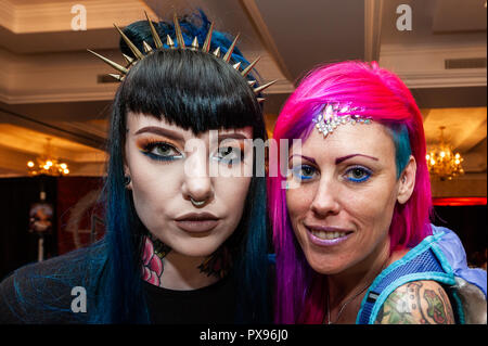 Skibbereen, West Cork, Ireland. 20th Oct, 2018. Pictured at the show are Kat Paine from Belfast and show organiser 'Pink Lady' from Leap. The show has been attended by many tattooists from across Ireland and the North. The event finishes tomorrow. Credit: Andy Gibson/Alamy Live News. Stock Photo
