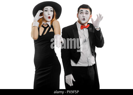 Two mimes talking on phone Stock Photo