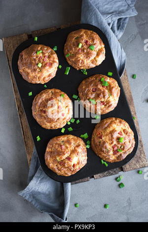 Protein breakfast egg muffins with bacon and vegetables. High protein muffins for ketogenic or paleo diet, close up. Stock Photo