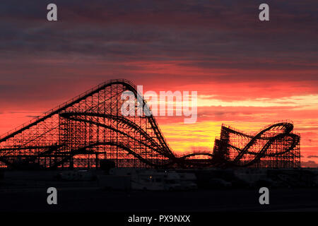 The Great White Roller Coaster at dawn on the boardwalk at Wildwood, New Jersey, USA Stock Photo