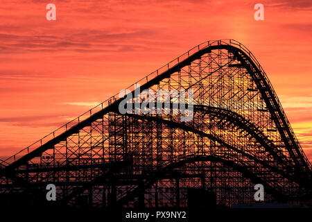 The Great White Roller Coaster at dawn on the boardwalk at Wildwood, New Jersey, USA Stock Photo