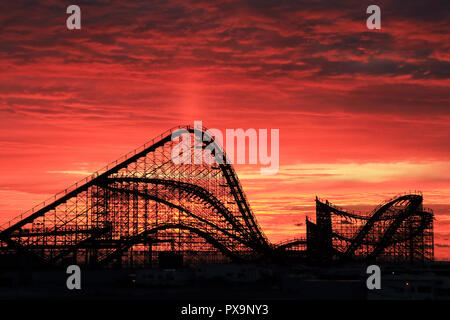 The Great White Roller Coaster at dawn on the boardwalk at Wildwood, New Jersey, USA Stock Photo