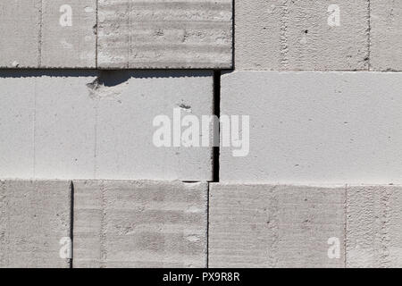 folded together large blocks of white or gray, used in construction Stock Photo