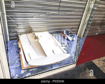 Broken show-window, violence, France, Burgundy, Dijon Stock Photo