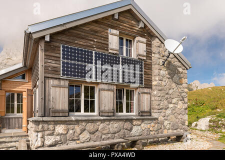 On a house facade fixed photovoltaic panels. Stock Photo