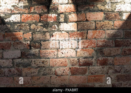 Old brick wall with three spot lights Stock Photo