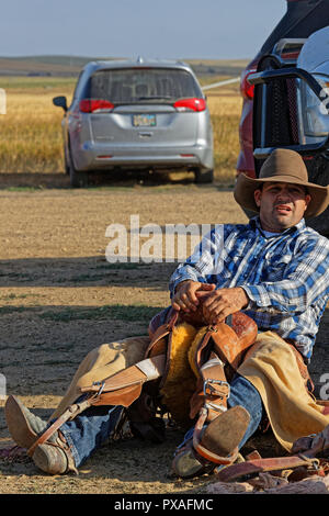 DUPREE, SOUTH DAKOTA, September 15, 2018 : Preparation for Saddle Bronc Riding during a regional Rodeo in Dupree. Rodeo is a sport that arose out of t Stock Photo