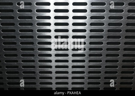stainless steel grating with oblong holes, close-up Stock Photo
