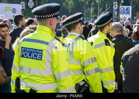 Policemen (Bobbies) on the beat in Parliament Square, Westminster, London, UK Stock Photo