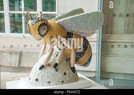 Dazzle Bee by Liz Faram.  One of the Bee in the City sculptures, Library Walk, St. Peter's Square, Manchester, UK. Stock Photo