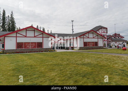 AUGUST 10 2018 - NORTH POLE, AK: Exterior view of the Santa Claus House, a gift shop filled with Christmas themed ornaments and merchandise Stock Photo