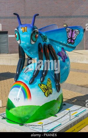 Bee-longing, by Neequaye.  One of the Bee in the City sculptures, National Squash Centre, Etihad Campus, Manchester, UK. Stock Photo