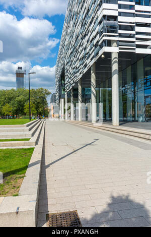 One of the Deansgate Square towers seen from the Brooks Academic building, Birley Campus, Manchester, England, UK. Stock Photo