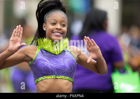 Indianapolis, Indiana, USA - September 22, 2018: The Circle City Classic Parade, African american cheerleader dancing during the parade Stock Photo
