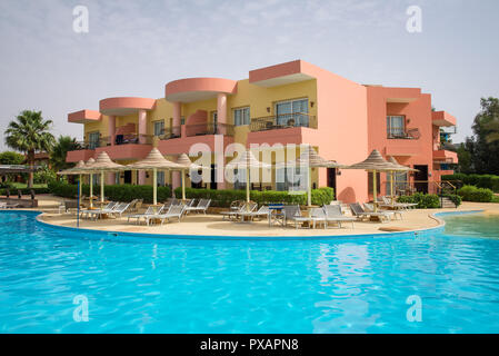 Five-star hotel with swimming pool in summer Stock Photo